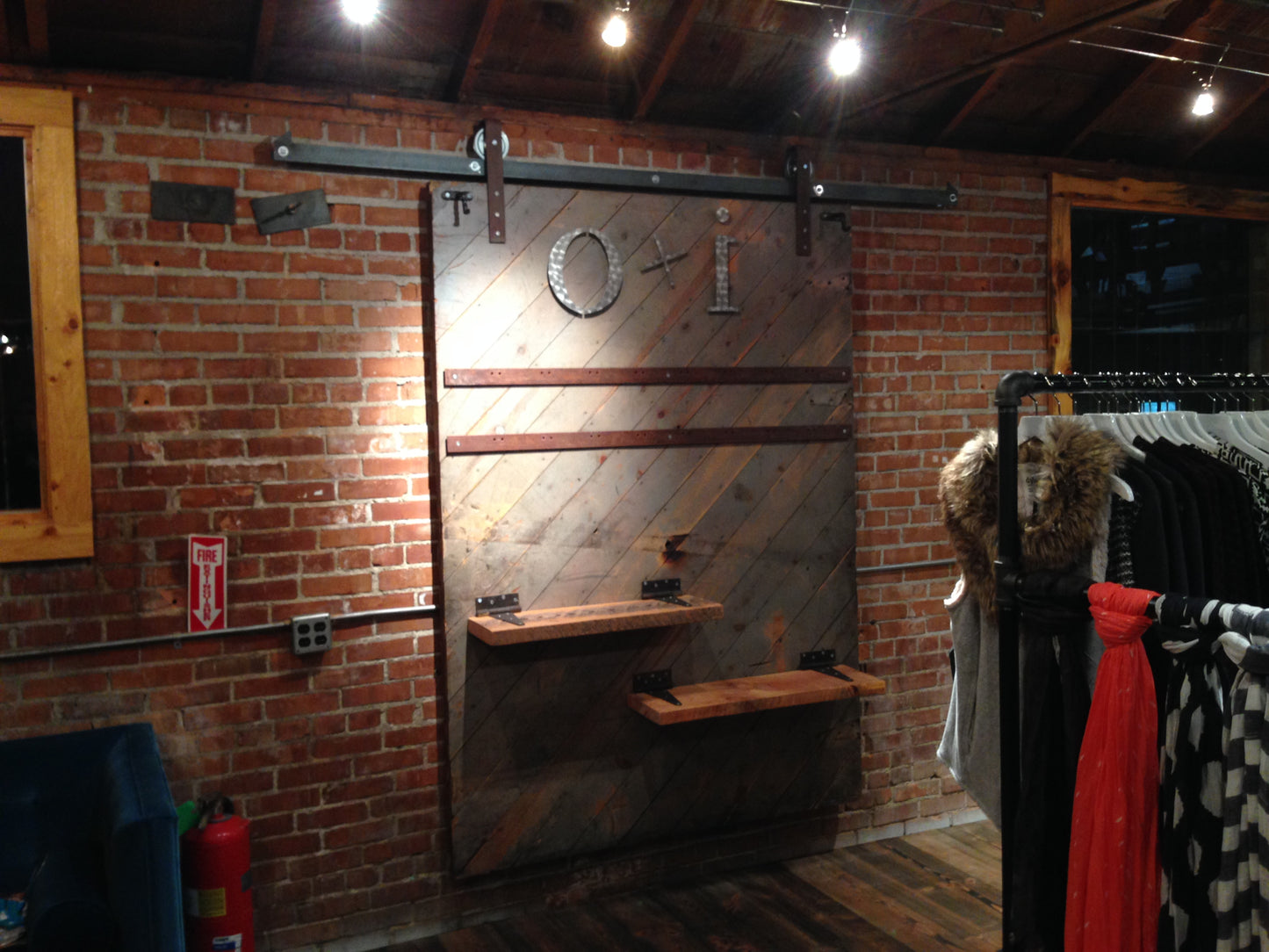 Warehouse door made into clothing display.