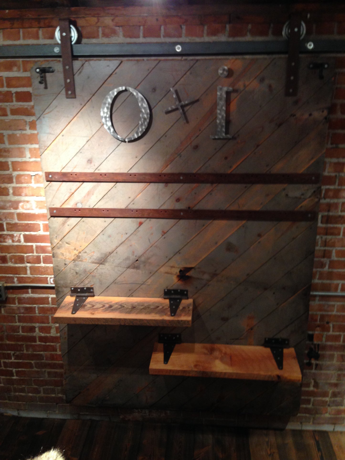 Warehouse door made into clothing display.